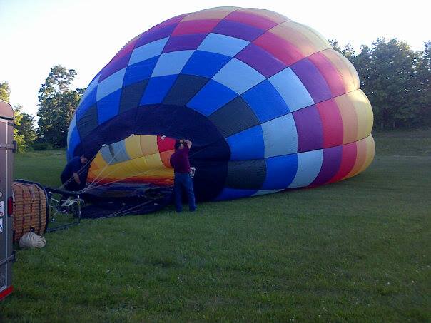 Airing her up!Hot Air Balloon Ride